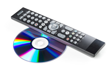 DVD, CD-ROM or Blu-Ray disc with tv or disc player remote control on white background. Home theatre movie or series concept