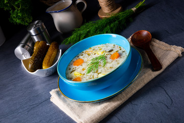 Polish sour cucumber soup or salt cucumber soup.