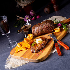 Butter Beef Steak with herbs and potato wedges