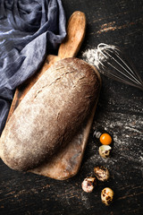 Freshly baked grain brown bread close up still life