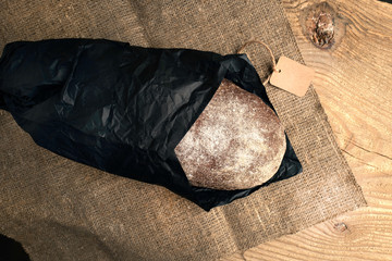 Freshly baked grain brown bread close up still life