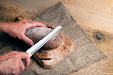Freshly baked grain brown bread close up still life