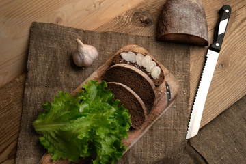 Freshly baked grain brown bread close up still life
