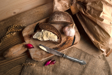Freshly baked grain brown bread close up still life