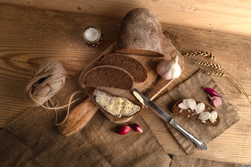 Freshly baked grain brown bread close up still life