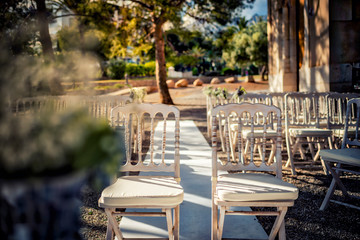 altar chairs of a wedding outdoors in nature