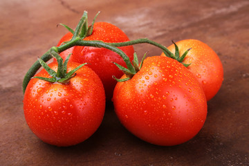 Tomato branch with Very fresh and delicious red tomatoes