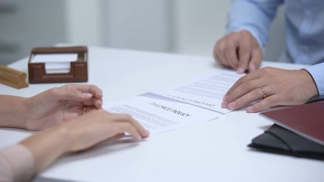 Ex spouses signing divorce policy, removing rings to get rid memories, relations