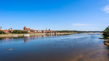 Fototapeta na wymiar Panoramic view of Torun city and Wisla (Vistula) river with bridges. Poland, summer 2019