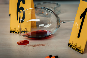 Traces found on a glass of wine , an ashtray at the crime scene