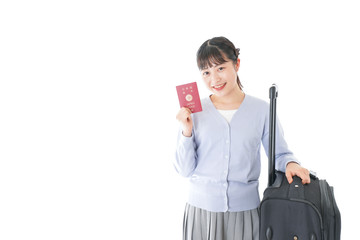 海外旅行に出かける若い女性