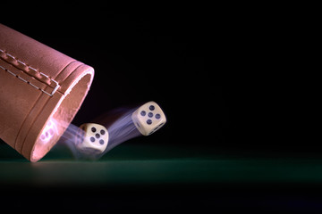 Devil's bones in flight. dice roll