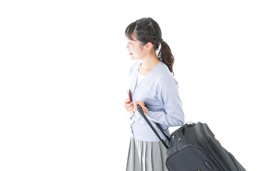 海外旅行に出かける若い女性