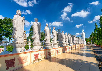 Beauty architecture leads to Lord Buddha statue shining in Dai Tong Lam Pagoda, which attracts...