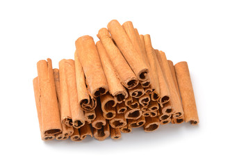 Aromatic cinnamon sticks on white background