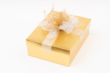 Gold gift box on white background