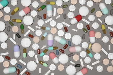 3d rendering of various tablets and pills from top view with a dark grey background