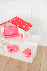 Doll houses in the children's room, furniture for children in the interior of the children's room