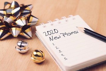 2020 New Year plan with gold decoration.