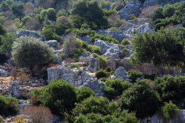 Fototapeta na wymiar The ruins of an ancient Lycian city on the shores of the Mediterranean Sea in Turkey