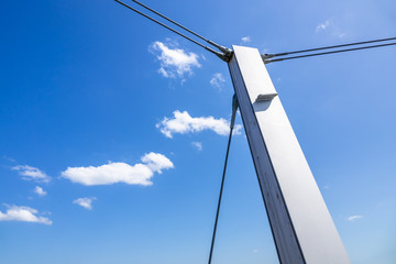 a pole in front of a blue sky