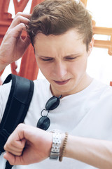 Better late than never. Close up of male tourist exploring the city