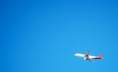 Plane in the sky. Place for your text.