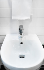 Bathroom interior. Bidet close-up view.