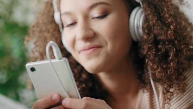 Close up of young woman using a smart phone
