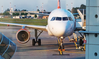 Passenger plane in the airport. Aircraft maintenance.