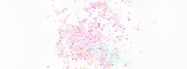 Fototapeta na wymiar Pearl pastel confetti sparkles on white background