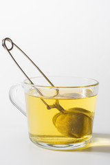 A cup of Chamomile tea in a clear glass mug