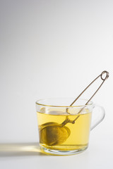 A cup of Chamomile tea in a clear glass mug