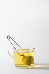 A cup of Chamomile tea in a clear glass mug