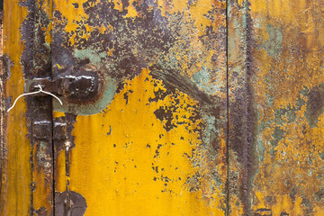 Metal door rusty corroded texture background.