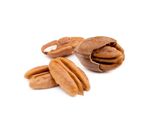 Shelled pecan nuts isolated on white background.