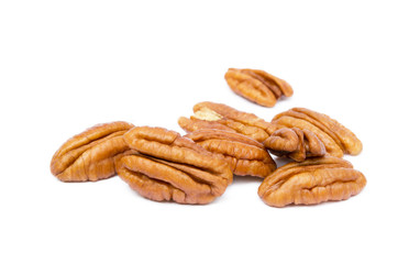 Shelled pecan nuts isolated on white background.