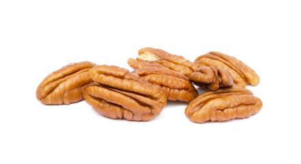 Shelled pecan nuts isolated on white background.