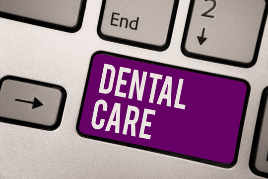Conceptual hand writing showing Dental Care. Business photo showcasing maintenance of healthy teeth or to keep it clean for future Keyboard purple key computer computing reflection document