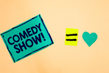 Text sign showing Comedy Show. Conceptual photo Funny program Humorous Amusing medium of Entertainment Turquoise piece paper reminder equal sign heart sending romantic feelings