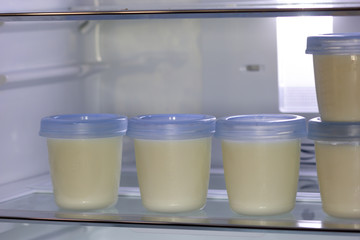 Breast milk storage stored in the back of refrigerator