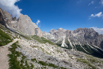 Fototapeta na wymiar Mugoni's small mountain group Cima Sud South summit and Zigolade pass as seen f in the middle of Catinaccio Rosengarten massif, Dolomites, Sout Tyrol, Italy
