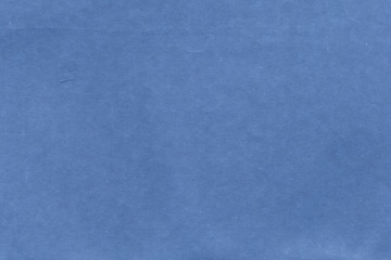 Cardboard texture close-up. Dark old paper background. Grunge concrete wall. Vintage blank wallpaper.