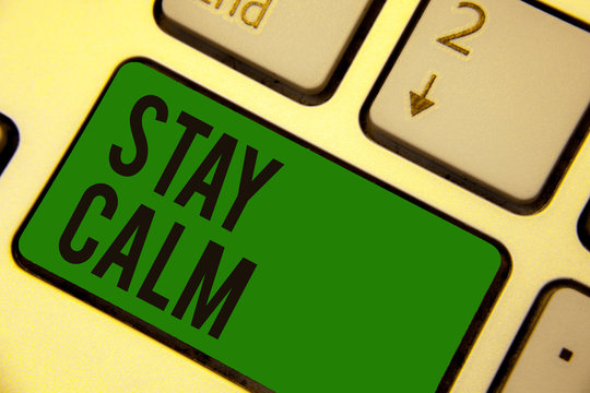 Writing note showing Stay Calm. Business photo showcasing Maintain in a state of motion smoothly even under pressure Keyboard green key Intention computer computing reflection document