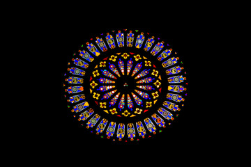 Stained sun shaped glass windows in Cathedral of Como, Italy