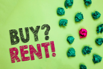 Text sign showing Buy question Rent. Conceptual photo Group that gives information about renting houses Crumpled wrinkled papers one different pink unique special green background