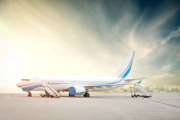 White big airplane on airport and free space for your decoration. 
