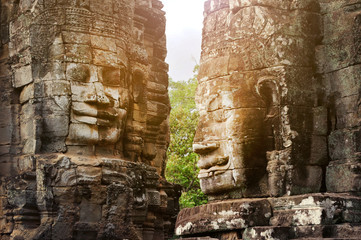 Stone murals and sculptures in Angkor wat, Smiling faces in the Temple of Bayon. Cambodia