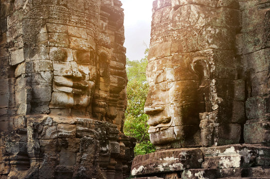 Stone murals and sculptures in Angkor wat, Smiling faces in the Temple of Bayon. Cambodia