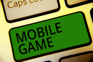 Handwriting text writing Mobile Game. Concept meaning they are entertaining programs made to work on smart device Keyboard green key Intention create computer computing reflection document